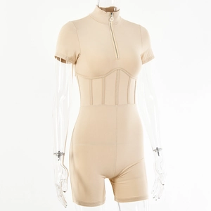 Detail of slim fit beige bodysuit featuring half-zip high neck and corset-style waist boning