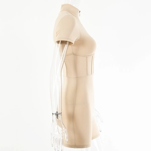 Detailed side view of beige slim-fit bodysuit with zipper neck and boning seams