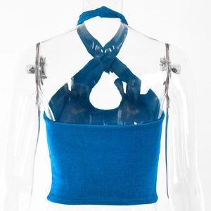 Detail of royal blue halter top showing knitted ribbed texture and open back design