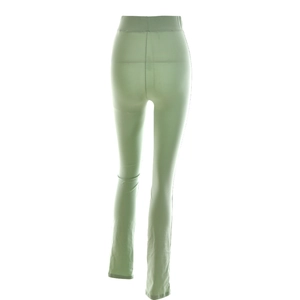 Détail du pantalon évasé vert clair à taille haute montrant le tissu et la vue arrière