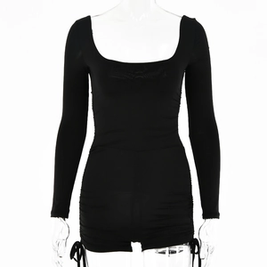 Detail of black long sleeve bodysuit with square neck and side drawstring ruched hem