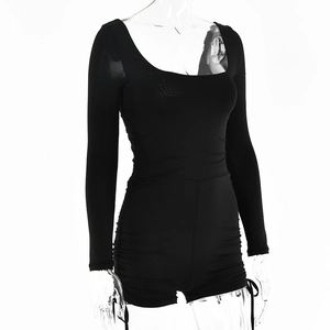 Close-up of black square-neck long sleeve romper with side ruched drawstring details