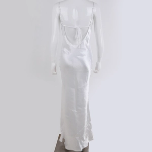 Detail of the backless satin maxi dress showing crossover strap details on a mannequin