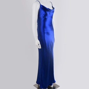 Detail of royal blue satin maxi dress with thin straps and elegant cowl neck design