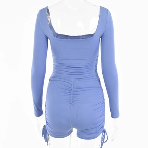 Detail view of back ruching and side drawstring on this light blue long sleeve bodysuit