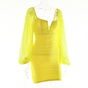 Detail of slim fit yellow mini dress featuring mesh lantern sleeves and V-neckline design