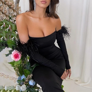 Detailed view of elegant black off-shoulder mini dress featuring luxury feather sleeve cuffs