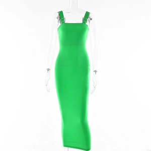 Detail view of bright green maxi dress featuring square rhinestone buckles on shoulder straps