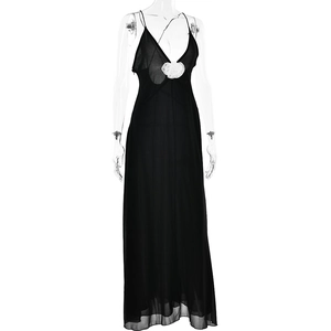 Detail of white 3D flower ornament on a black deep V-neck chiffon maxi dress