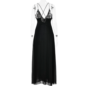 Detailed back view of a black chiffon maxi dress with thin criss-cross straps and open back