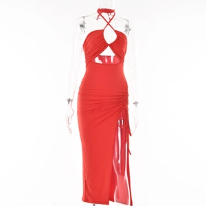 Detail of red halter neck dress featuring front cutout and side drawstring ruching details
