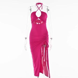 Detail of rose pink halter neck dress featuring side drawstring ruching and high slit