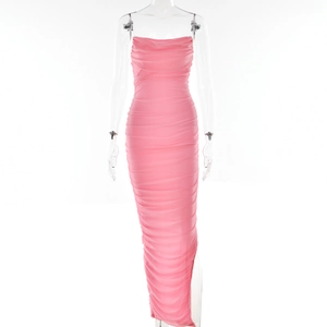 Close-up of pink strapless bodycon maxi dress with ruched fabric detailing