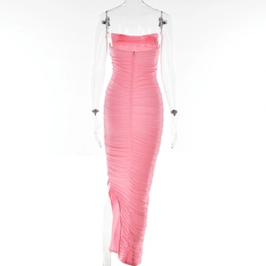Detail view of the pink ruched fabric texture and hidden back zipper on the long dress