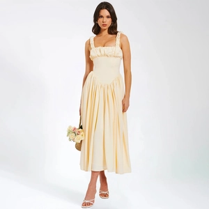 Elegant pale yellow camisole midi dress with ruffle straps and pleated bust detail