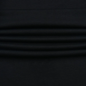 Close-up of black high-waisted sports trousers featuring soft ribbed knitted texture