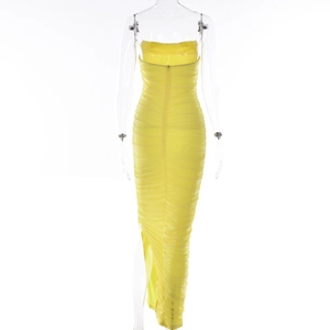Macro view of horizontal ruched textures and back zipper on yellow bodycon dress