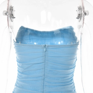 Detail view of the sky blue ruched tube top featuring a hidden back zipper closure