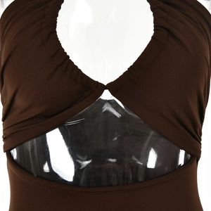 Detail of dark brown halter neck dress featuring ruched design and front cutout detail