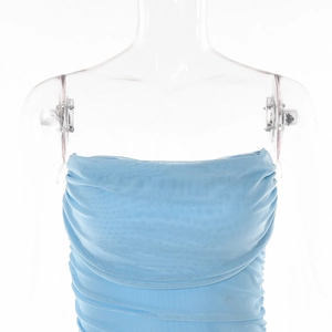 Detailed view of light blue mesh fabric with layered ruffles and delicate pleats