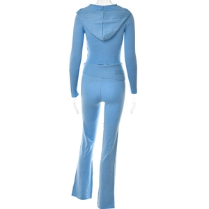Detail view of the sky blue knitted two-piece set featuring a hoodie and flare trousers