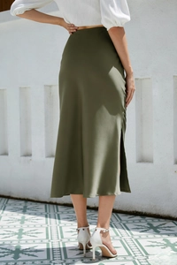 Rear view of an elegant olive green satin midi skirt featuring a side slit and high elastic waist