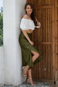 Elegant two-piece set with white off-shoulder crop top and olive green satin slit skirt
