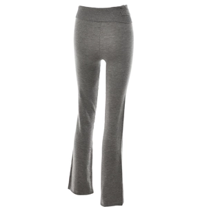 Detail of grey knitted flared trousers with high-waisted ribbed waistband and textured fabric