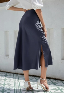 Elegant navy blue satin midi skirt featuring a high side slit and smooth draped finish