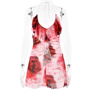 Halter neck mini dress with red floral print and ruffle details on a white background