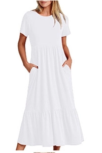 Detailed view of white tiered summer dress featuring short sleeves and functional side pockets