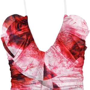 Detail of red rose print dress with deep V-neckline and decorative ruffled edges