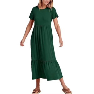 Detail view of the deep green tiered dress featuring a high waist and round neckline