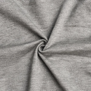 Close-up of grey knitted fabric texture showing fine vertical ribbed patterns and soft drape
