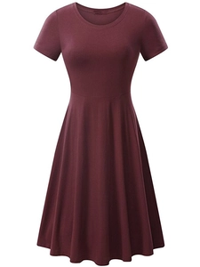 Detail view of burgundy short-sleeved A-line dress with round neck and high waist cut