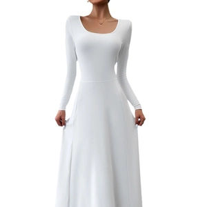 Detail showing the elegant A-line silhouette and slim-fit waist of the white dress