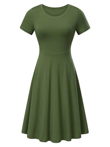 Detail of dark green short sleeve knit dress with round neck and A-line waist