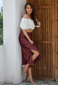 Elegant wine red satin midi skirt with side slit and white off-shoulder puff sleeve top