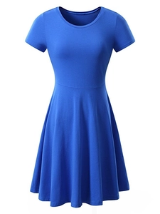 Detail view of the royal blue crew neck dress with short sleeves and high waist cut