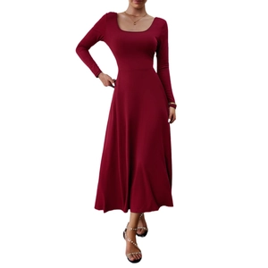 Detail of elegant dark red long sleeve maxi dress featuring high waist A-line silhouette