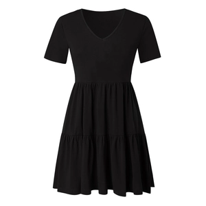 Detail of short-sleeve V-neck black dress with tiered skirt and high-waist pleats
