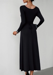 Back view of elegant black long sleeve maxi dress featuring a cinched waist tie