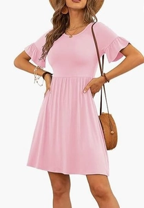 Close-up of light pink dress featuring ruffle sleeves and soft knitted texture details
