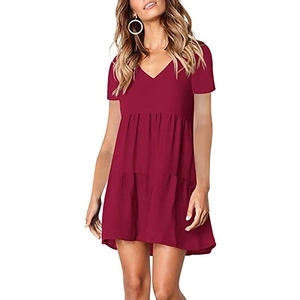 Detail of burgundy V-neck short sleeve tiered dress with smooth draping fabric texture