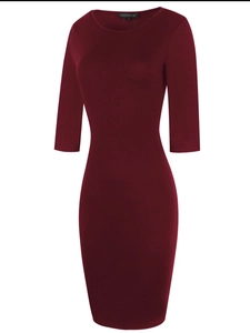Detail view of the round neckline and internal brand label of the burgundy bodycon dress