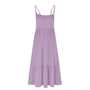 Detail of lavender tiered dress featuring thin spaghetti straps and layered summer skirt