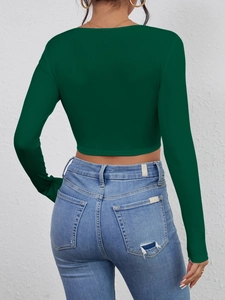 Rear view of a slim fit dark green ribbed cropped top with extra long sleeves