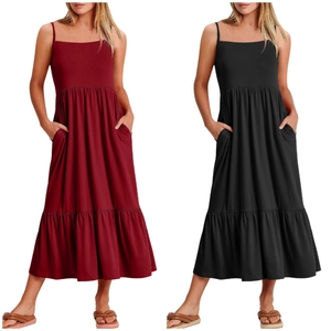 Detail of tiered sleeveless maxi dress showing pockets and flowing layered skirt design