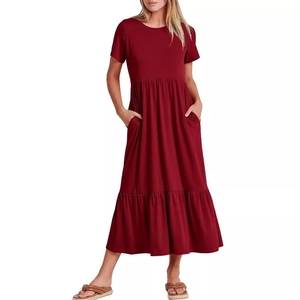 Detail of burgundy tiered leisure dress showing tiered skirt layers and side pockets