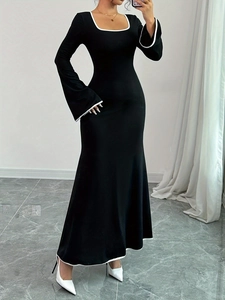Elegant slim-fit black long-sleeve dress with square neckline and white contrast trim